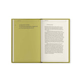 Open notebook with text on a white background