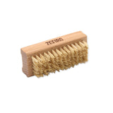 Wooden nail brush with bristles on a white background, branded 'Zefiro'.