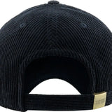 Back view of black corduroy cap with a gold tag on a white background