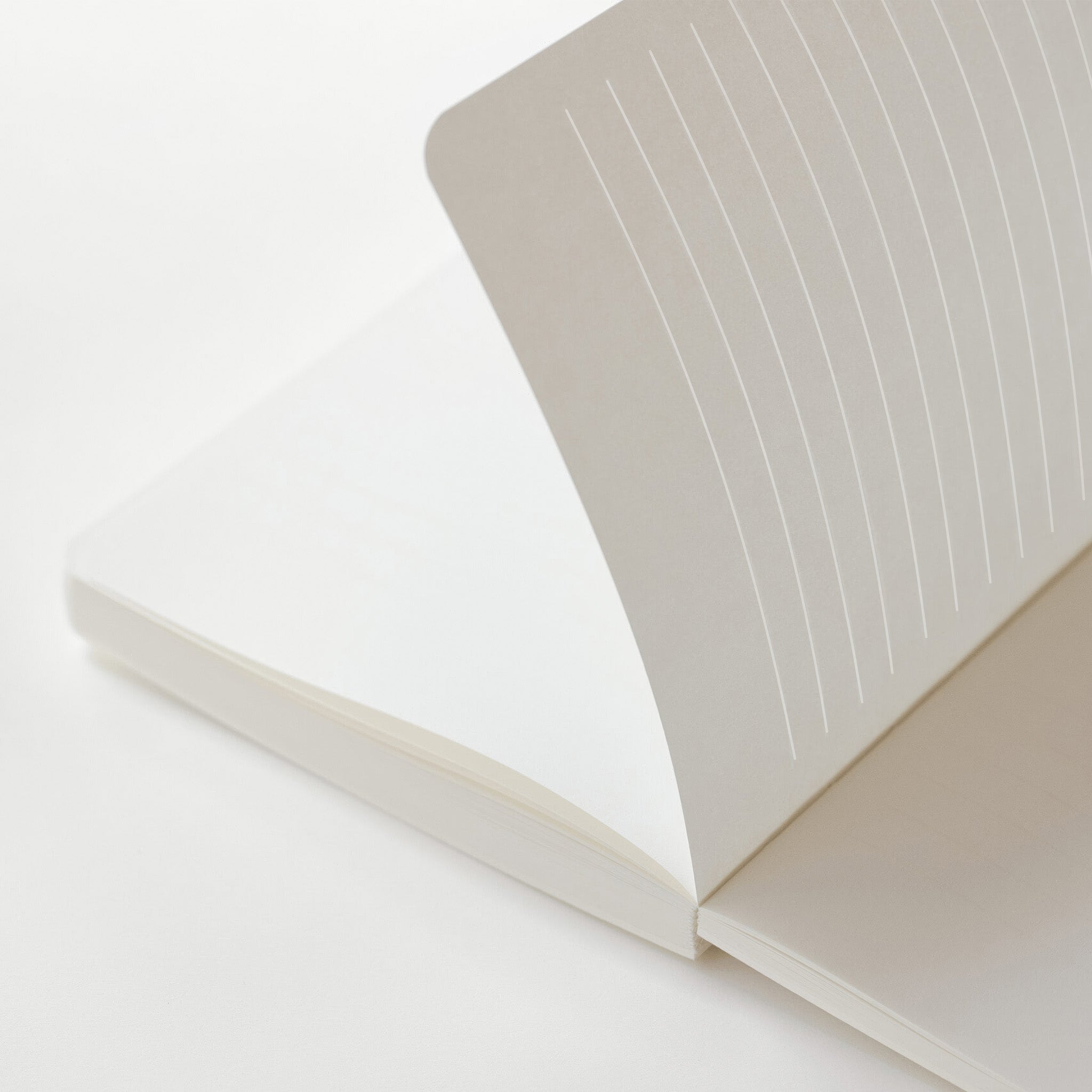 Opened iA notebook for writers on a white background, 