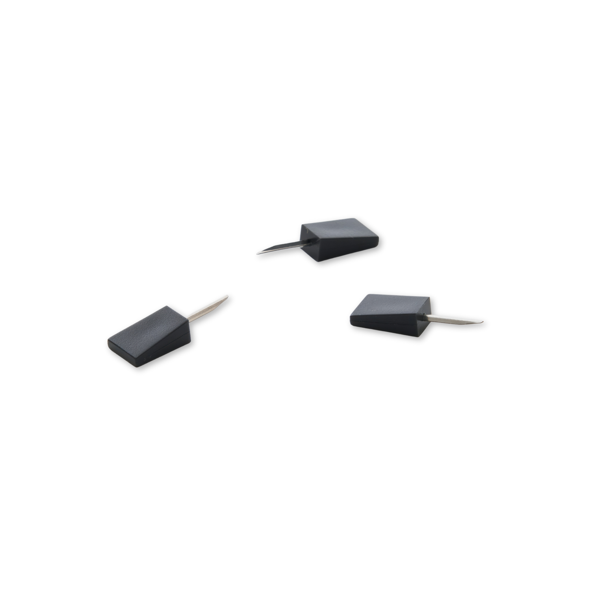 Three black ninja mini pins on a white background