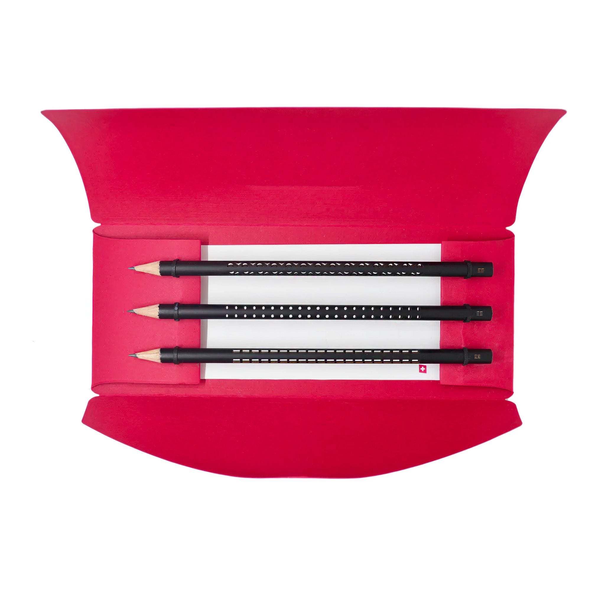 Set of black pencils with unique designs encased in a red envelope