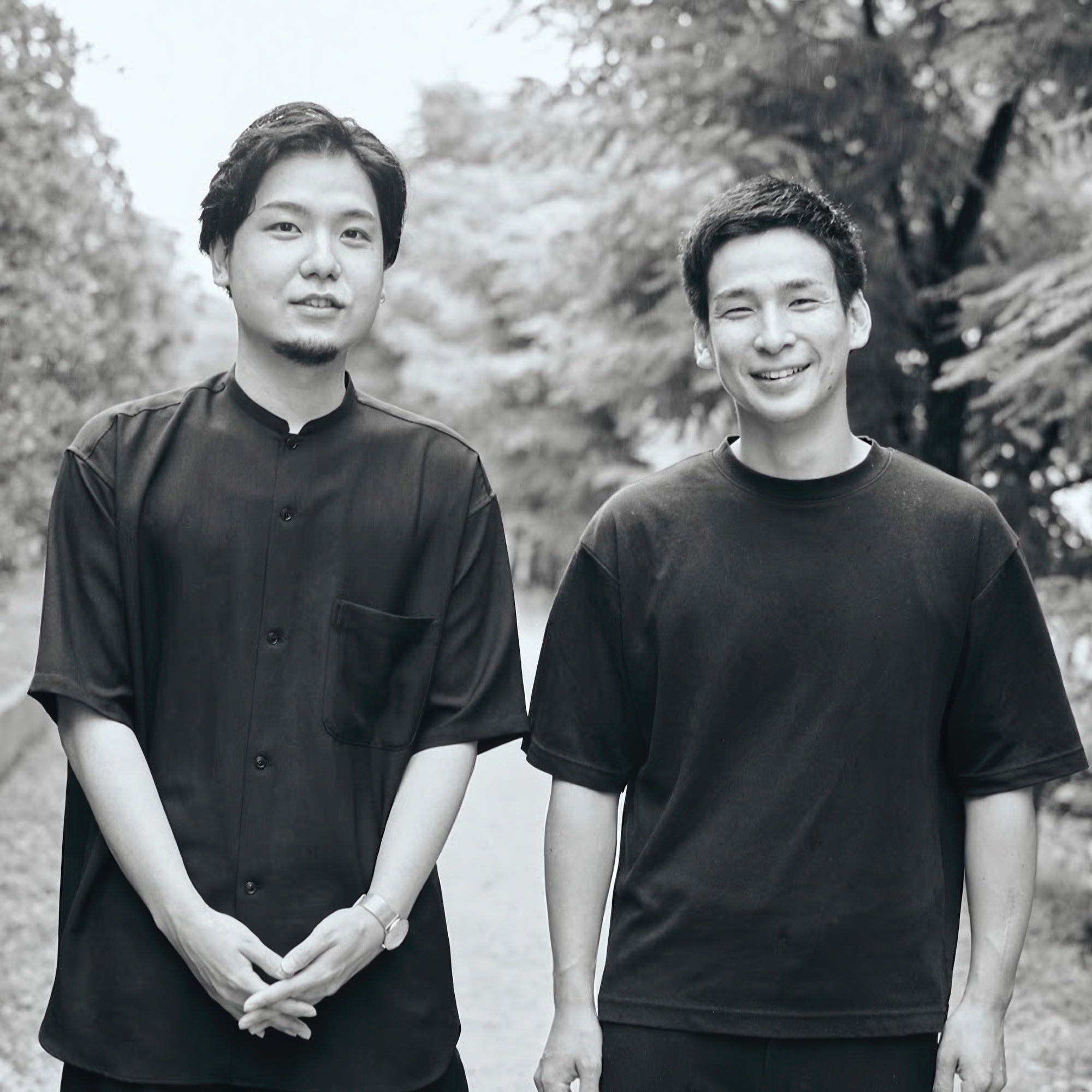 Black and white profile picture of design unit wah - Masataka Wakisaka and Takashi Hatta