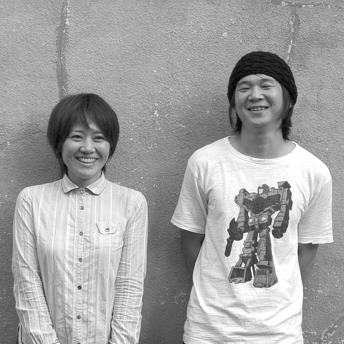 Black and white profile picture of design unit switch - Tomonori Ohata and Hiromi Taki