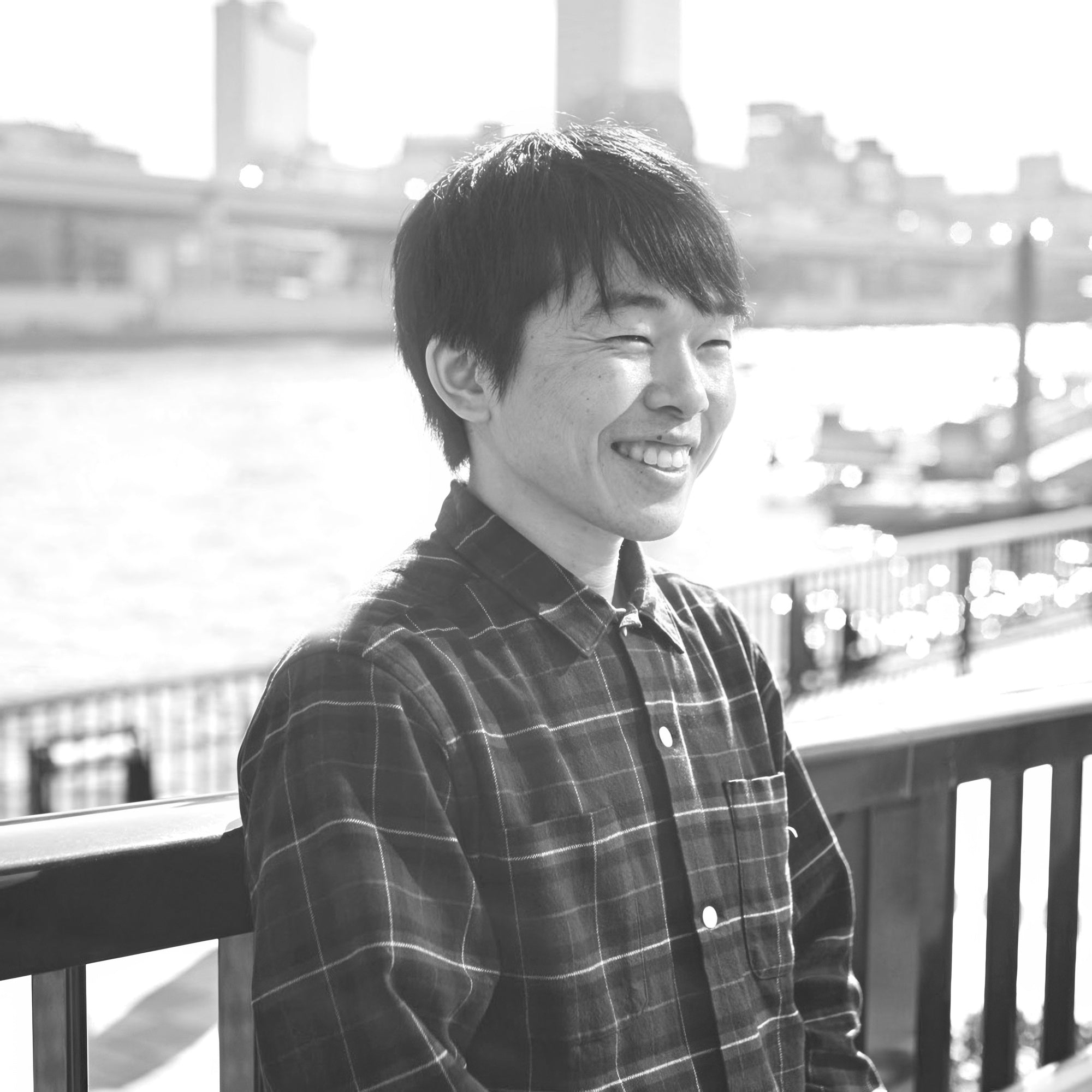 Black and white profile picture of designer Yuzo Azu