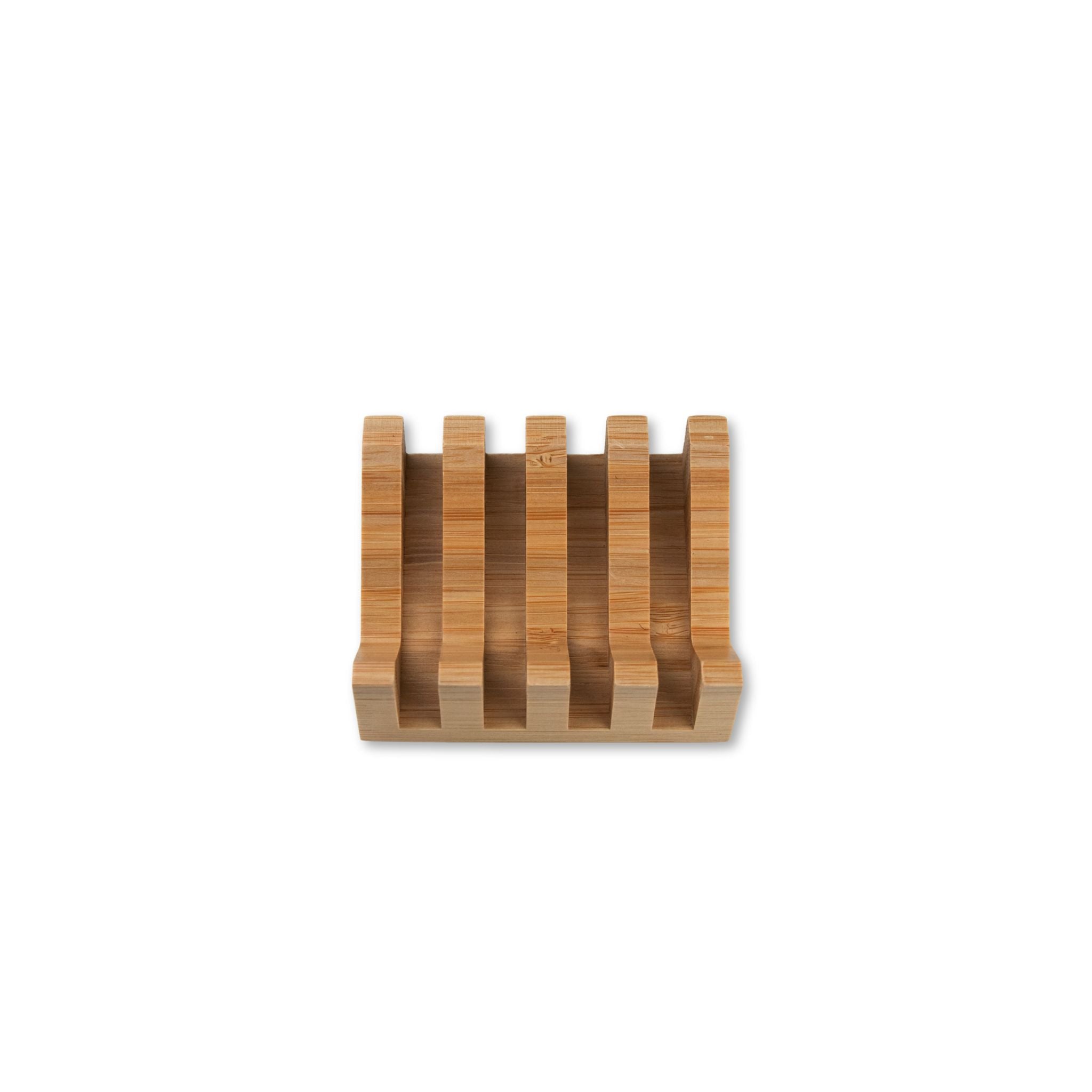 Slanted wooden soap dish on a white background