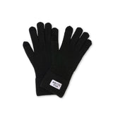 Black gloves with a visible brand label on a white background