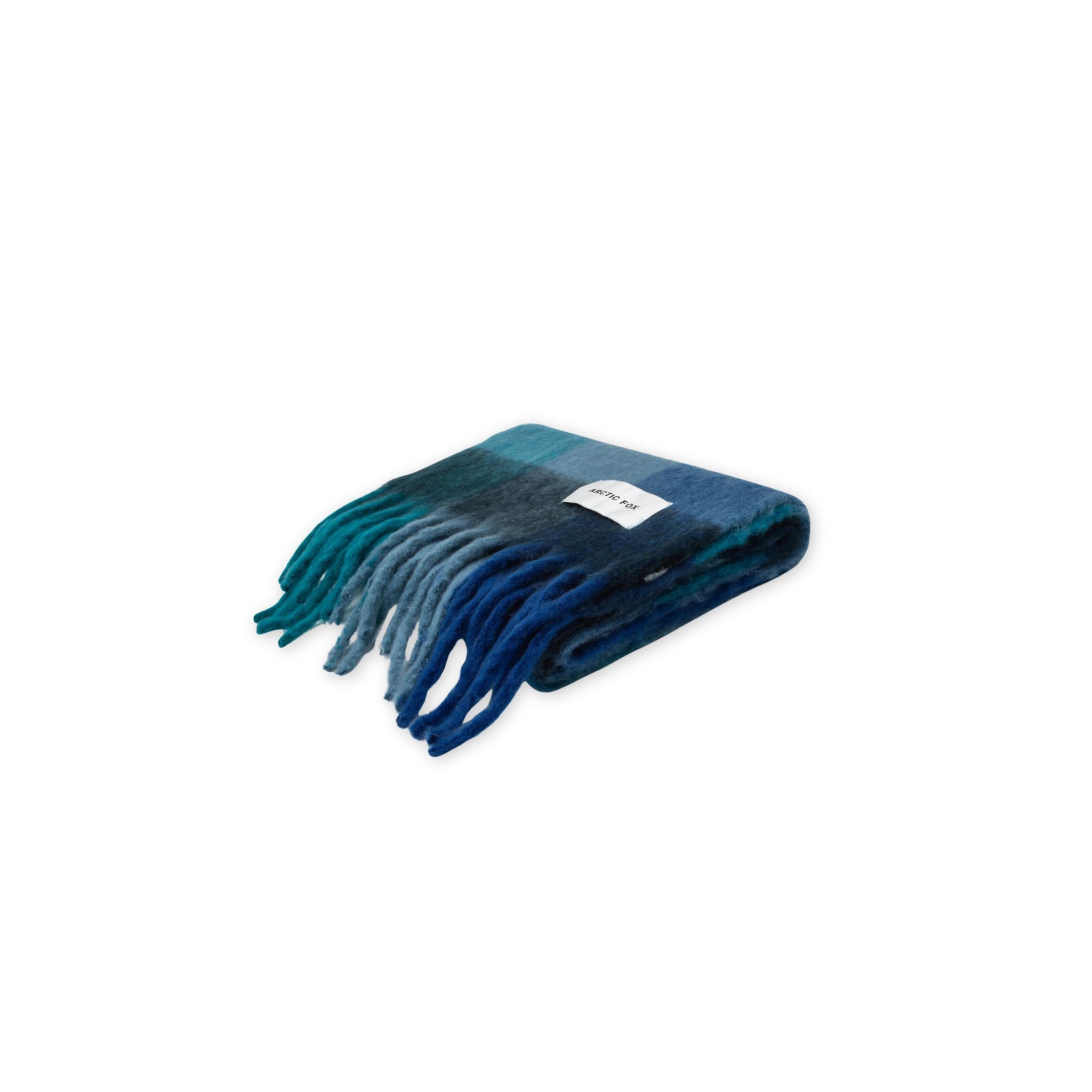 Blue plaid scarf with fringes on a white background