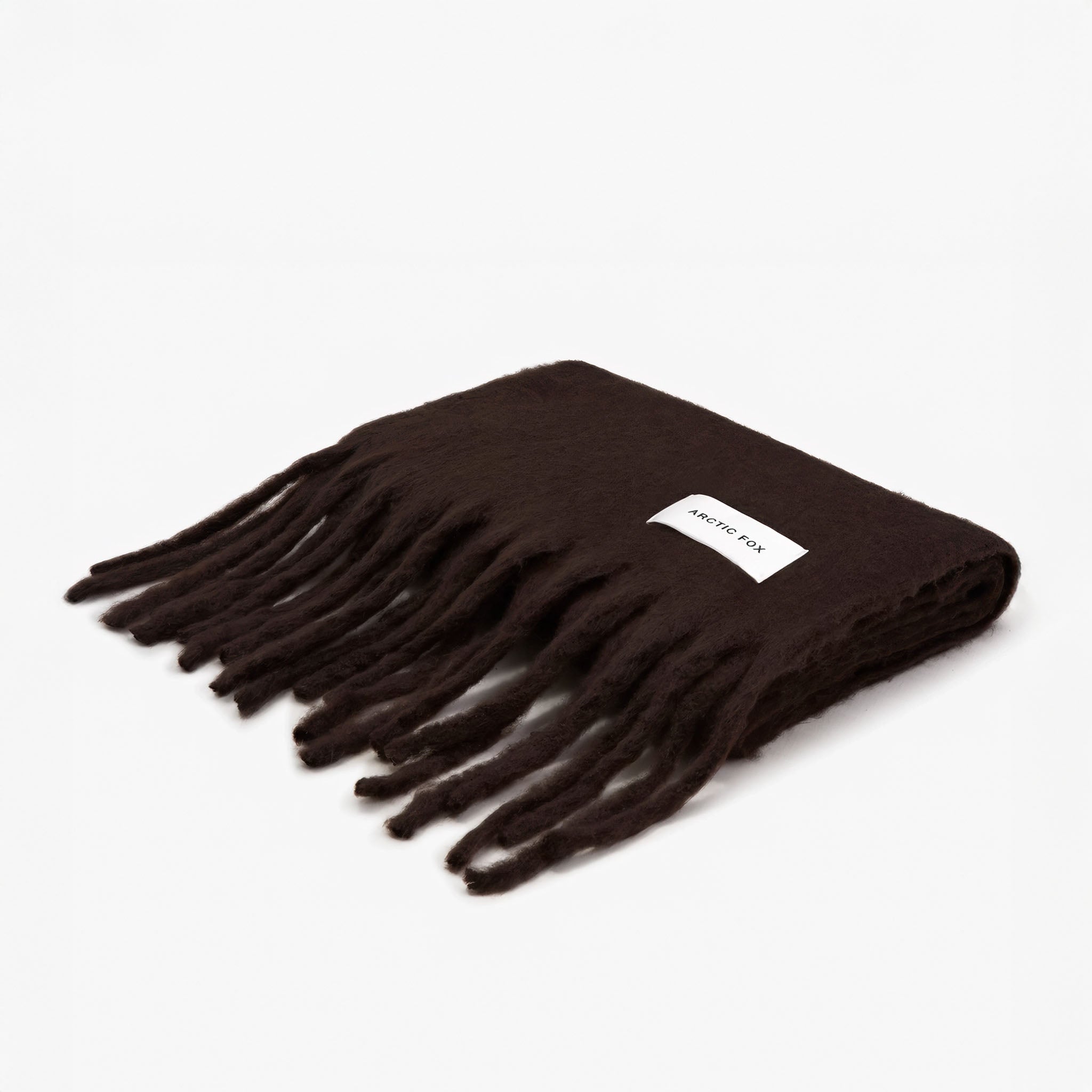 Brown scarf folded with a brand label Arctic Fox on a white background