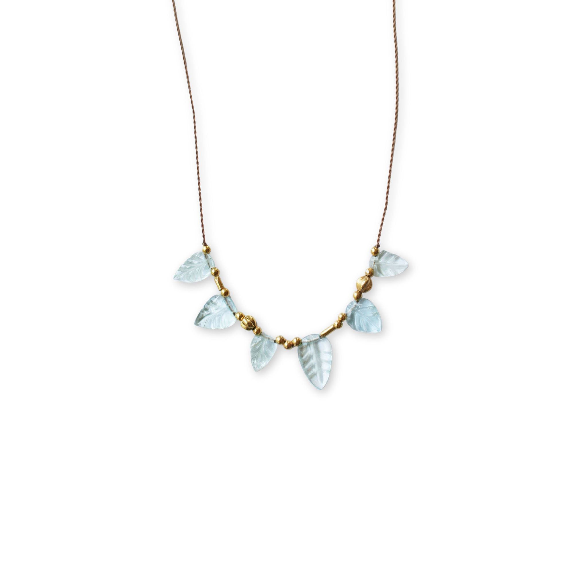 See Real Flowers Leaf Necklace w/ Aquamarine and gold beads on a white background