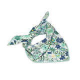 Floral patterned scarf on a white background with dark and light blue colors prominent