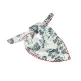 Floral patterned scarf on a white background with faded blue and deep red colors prominent