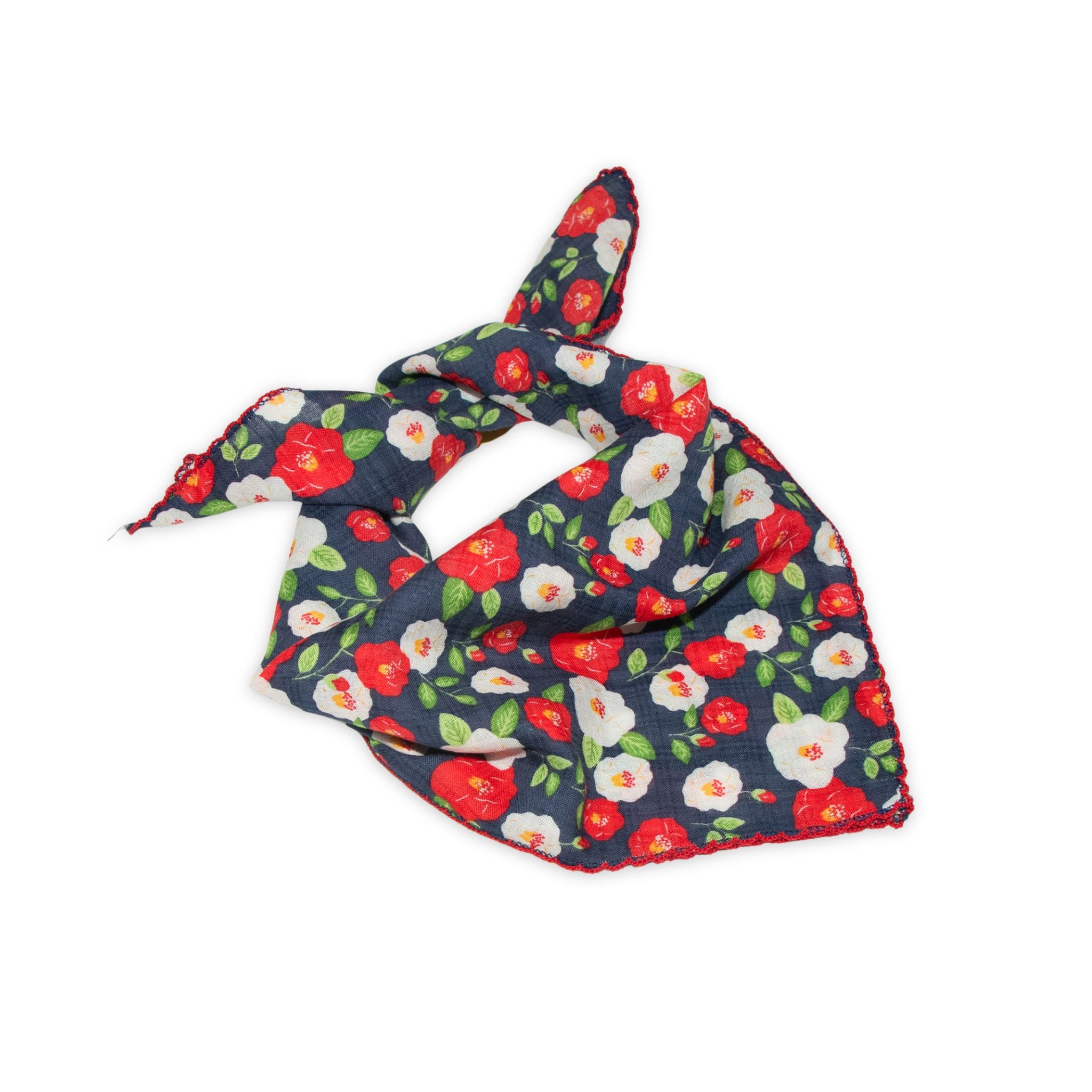 Floral patterned scarf on a white background with red and denim blue colors prominent