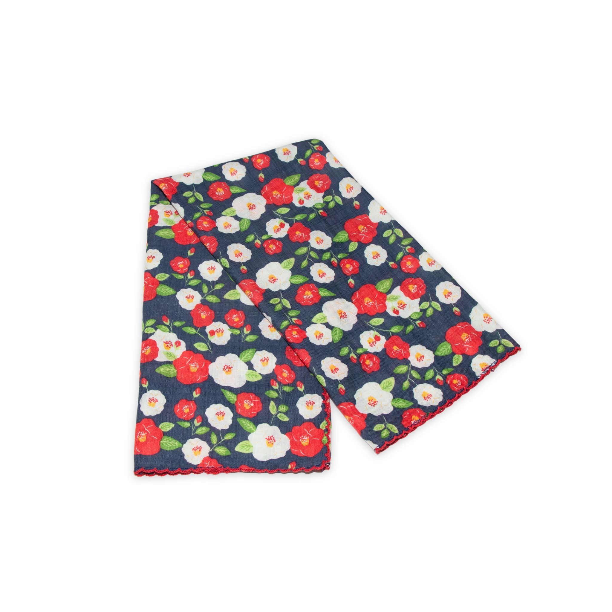 Floral patterned scarf on a white background with red and denim blue colors prominent