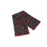 Cherry patterned scarf on a white background with red and dark denim navy colors prominent