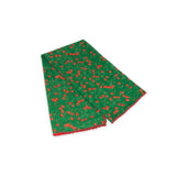 Cherry patterned scarf on a white background with red and deep green colors prominent