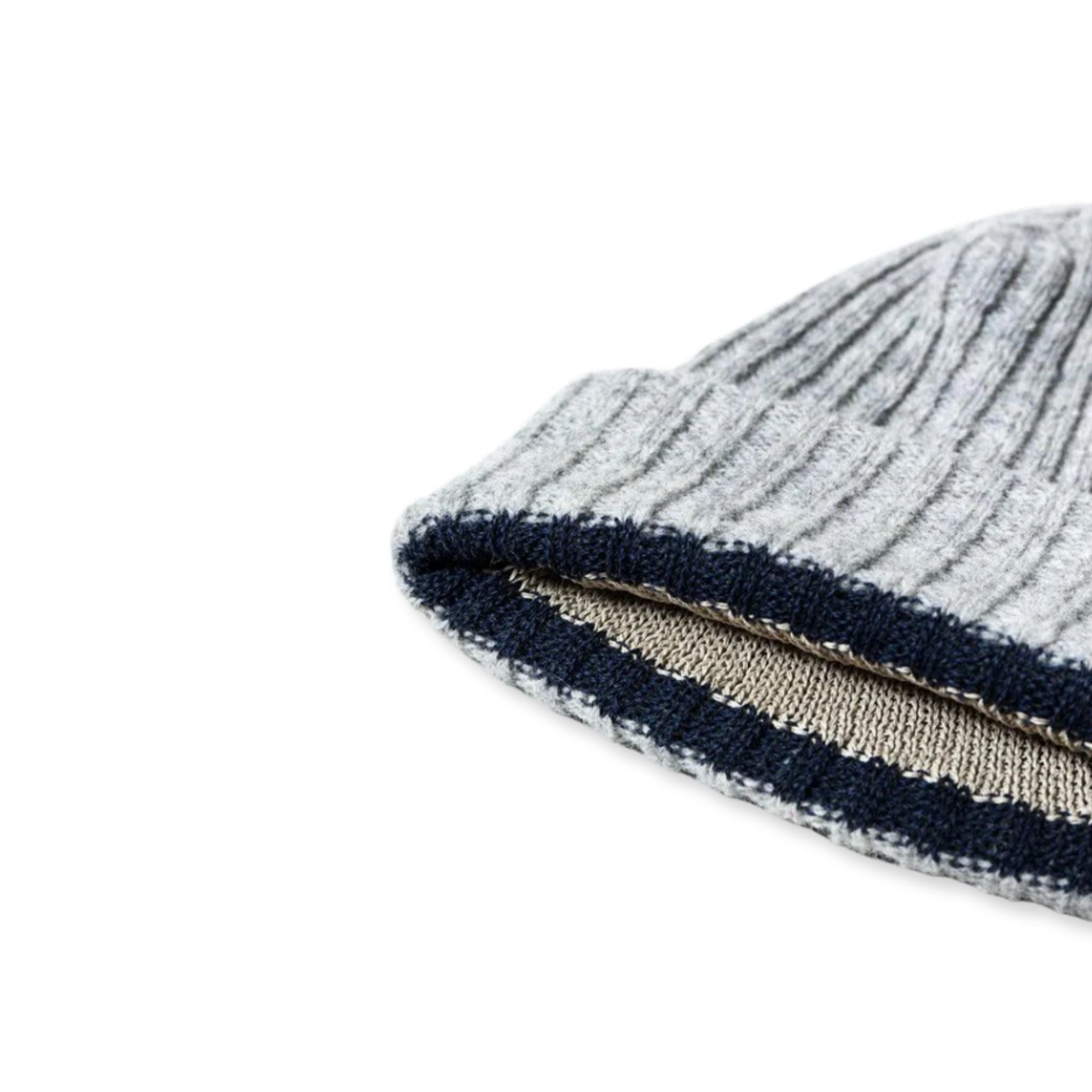 Close-up of a grey with a navy striped pattern on a white background