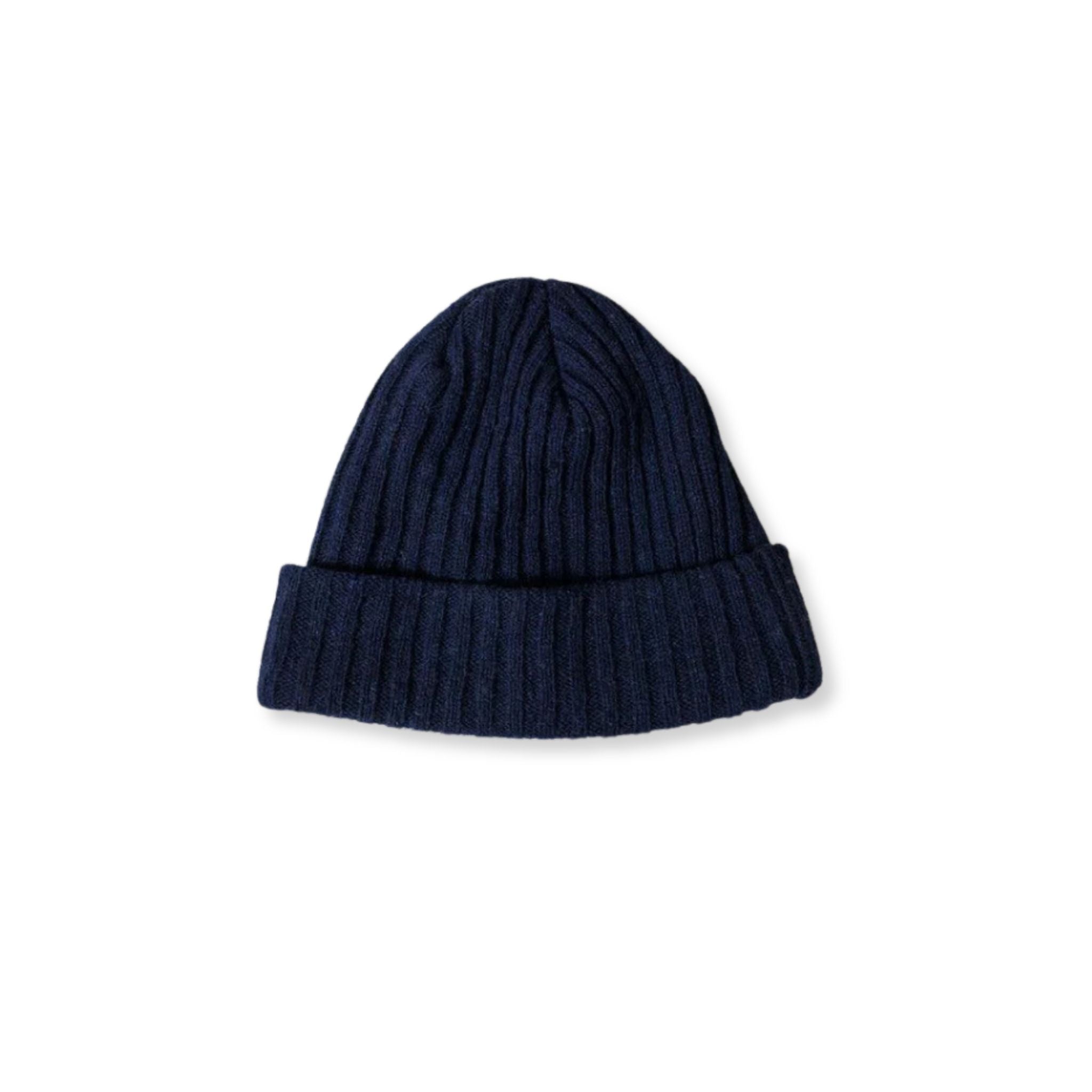 Navy blue knit beanie on a white background