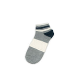 Striped sock with gray, white, and navy colors on a white background