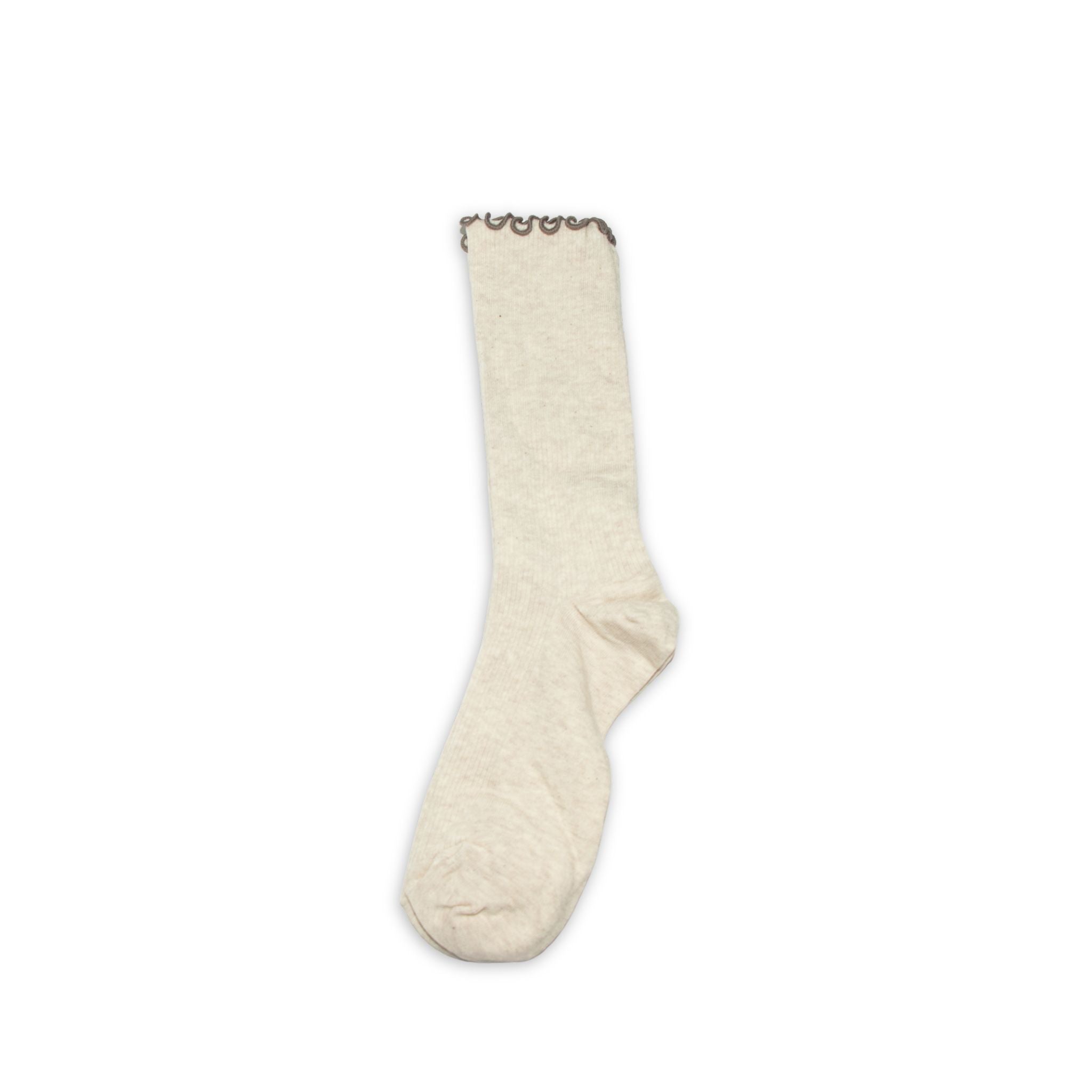 White sock with light brown lace trim on a white background