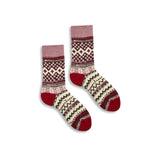 Pair of patterned socks with red accents on a white background