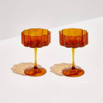 image of two fazeek champagne glasses amber color