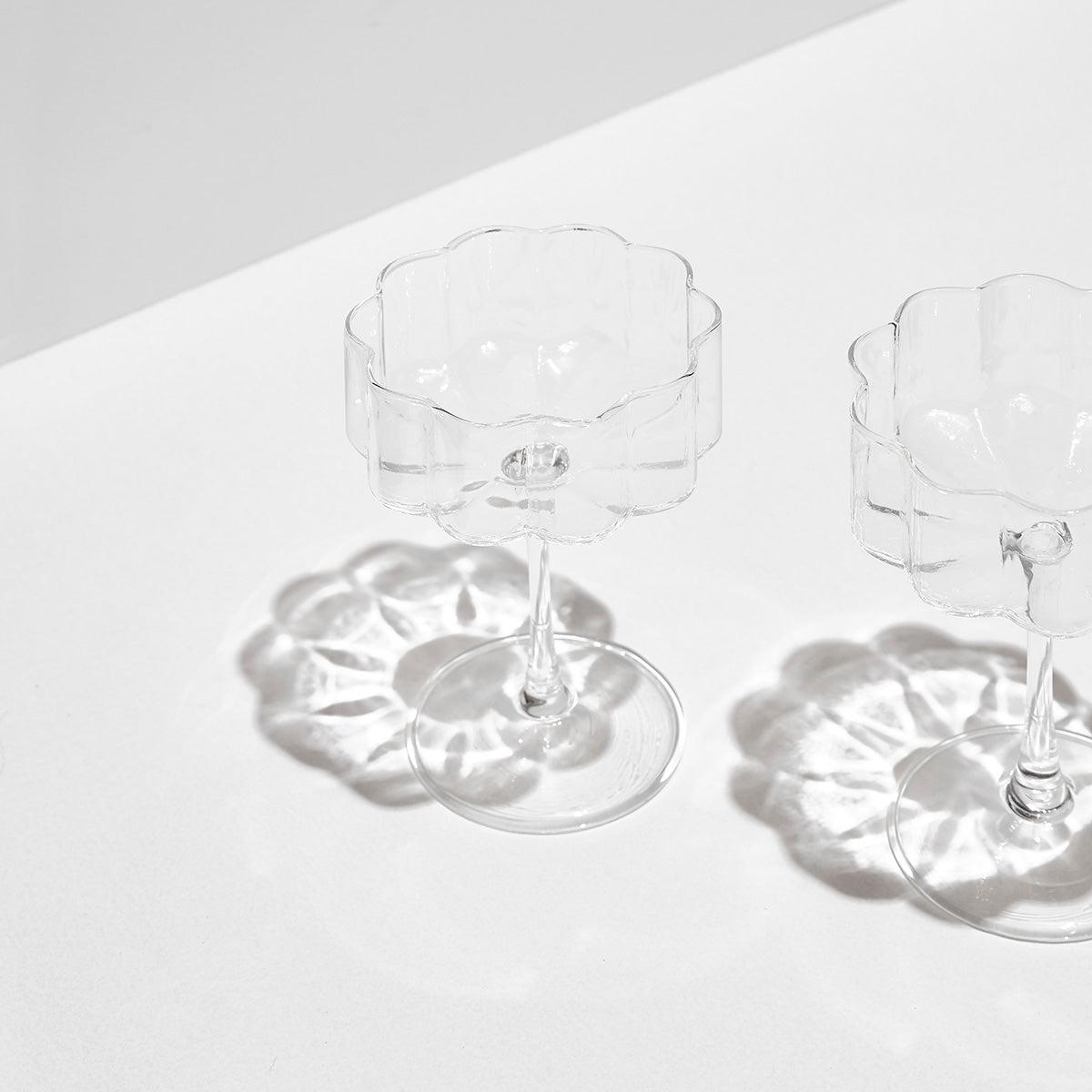 lifestyle image of two fazeek champagne glasses clear color 