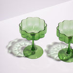 lifestyle image of two fazeek champagne glasses green color 