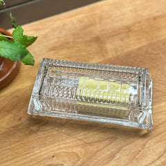 image of home eat drink earth nest butter dish closed half filled with butter stick