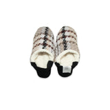 Pair of slippers with plaid pattern on a white background