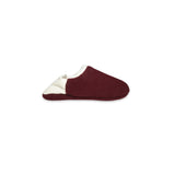 Side view of burgundy colored  slippers with white trim on a white background