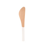 Wooden spoon with a white handle on a white background