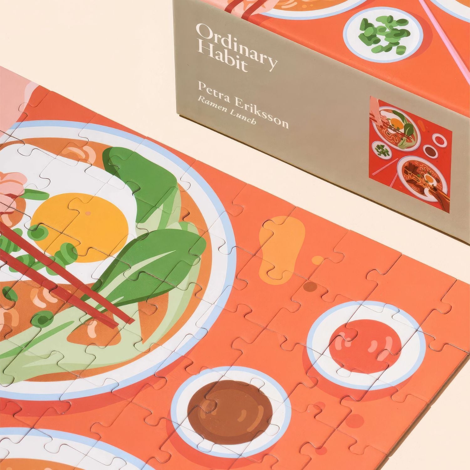Close up view of puzzle and part of box of Ordinary Habit's 100pc Ramen Lunch puzzle 