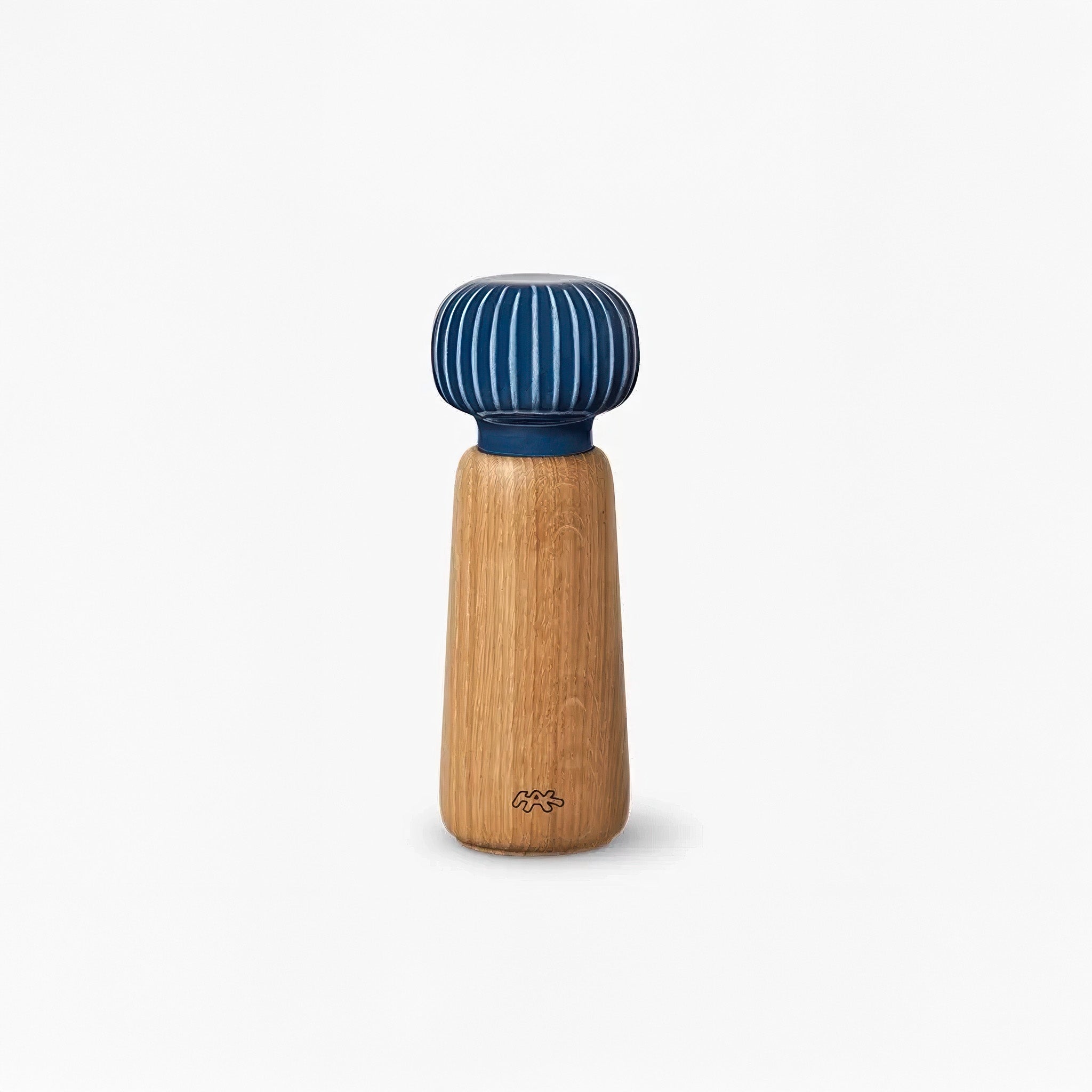 Hammershoi 7.3" oak ceramic spice grinder with blue top on a white background