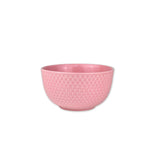 Rose pink textured bowl on a white background