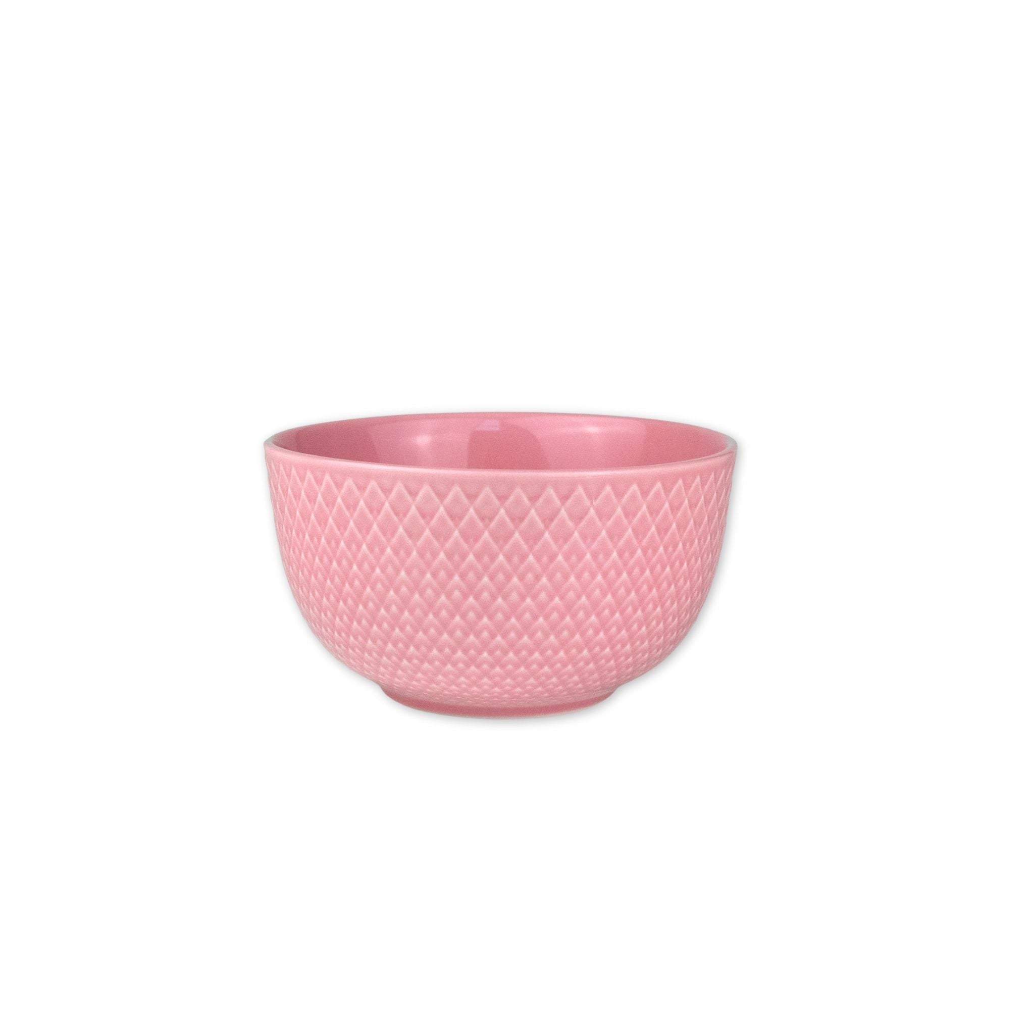Rose pink textured bowl on a white background