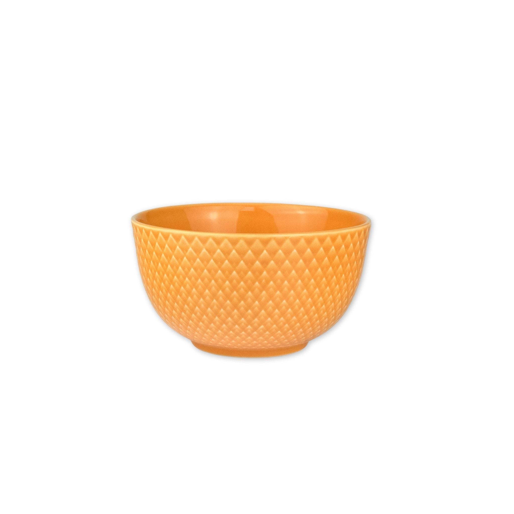 Orange-yellow textured bowl on a white background