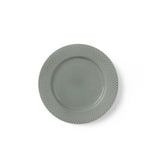 Green textured plate on a white background