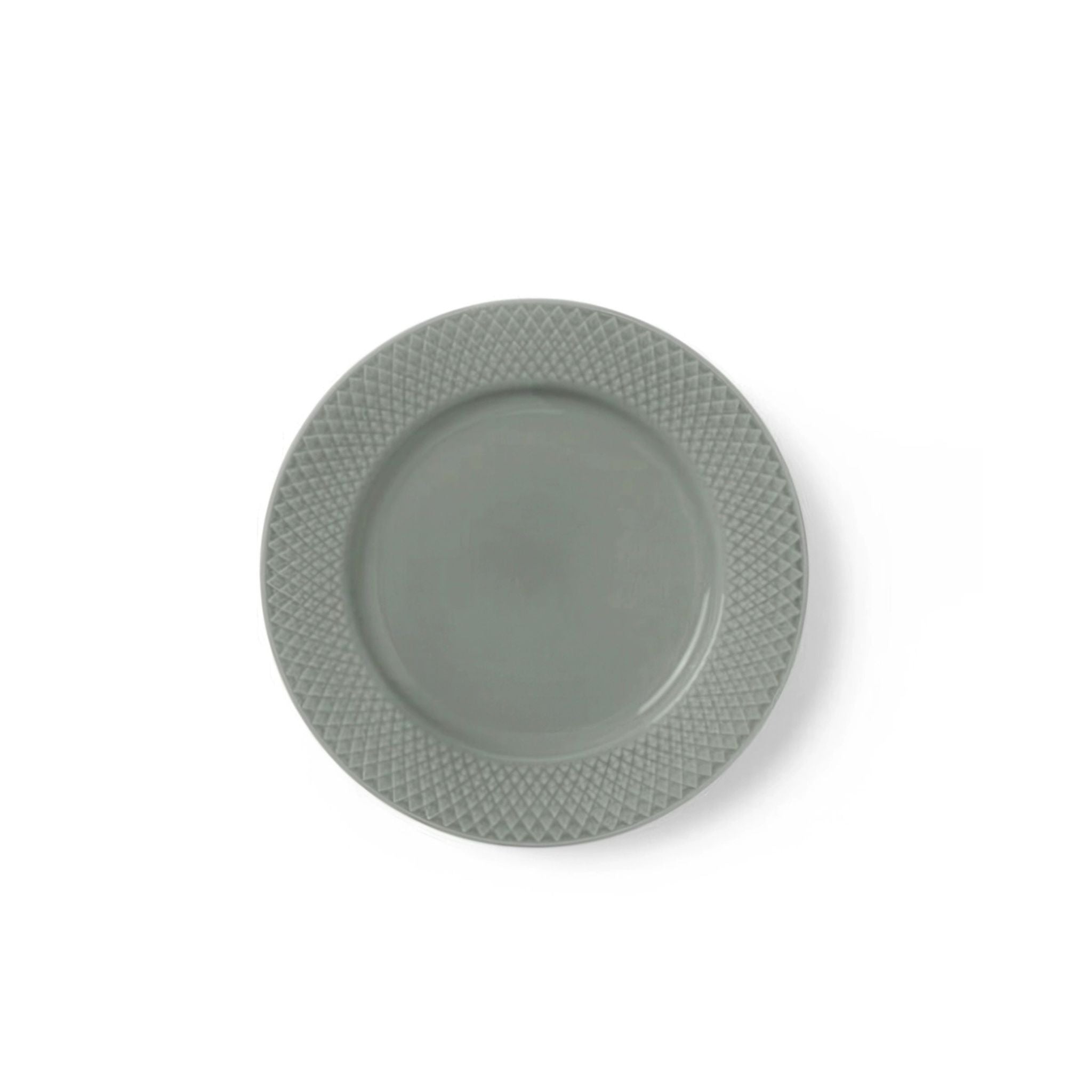 Green textured plate on a white background