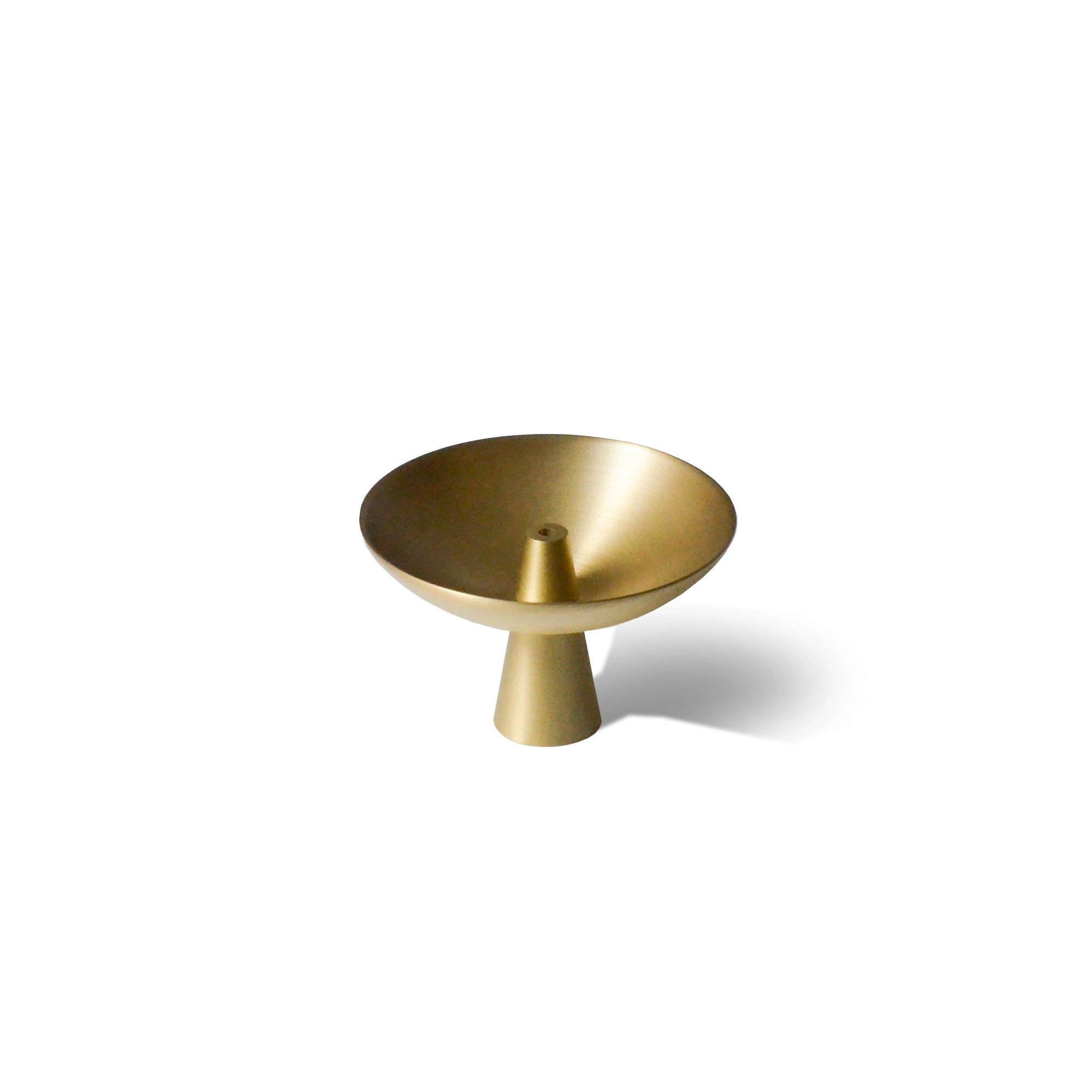 Brass incense holder on a white background