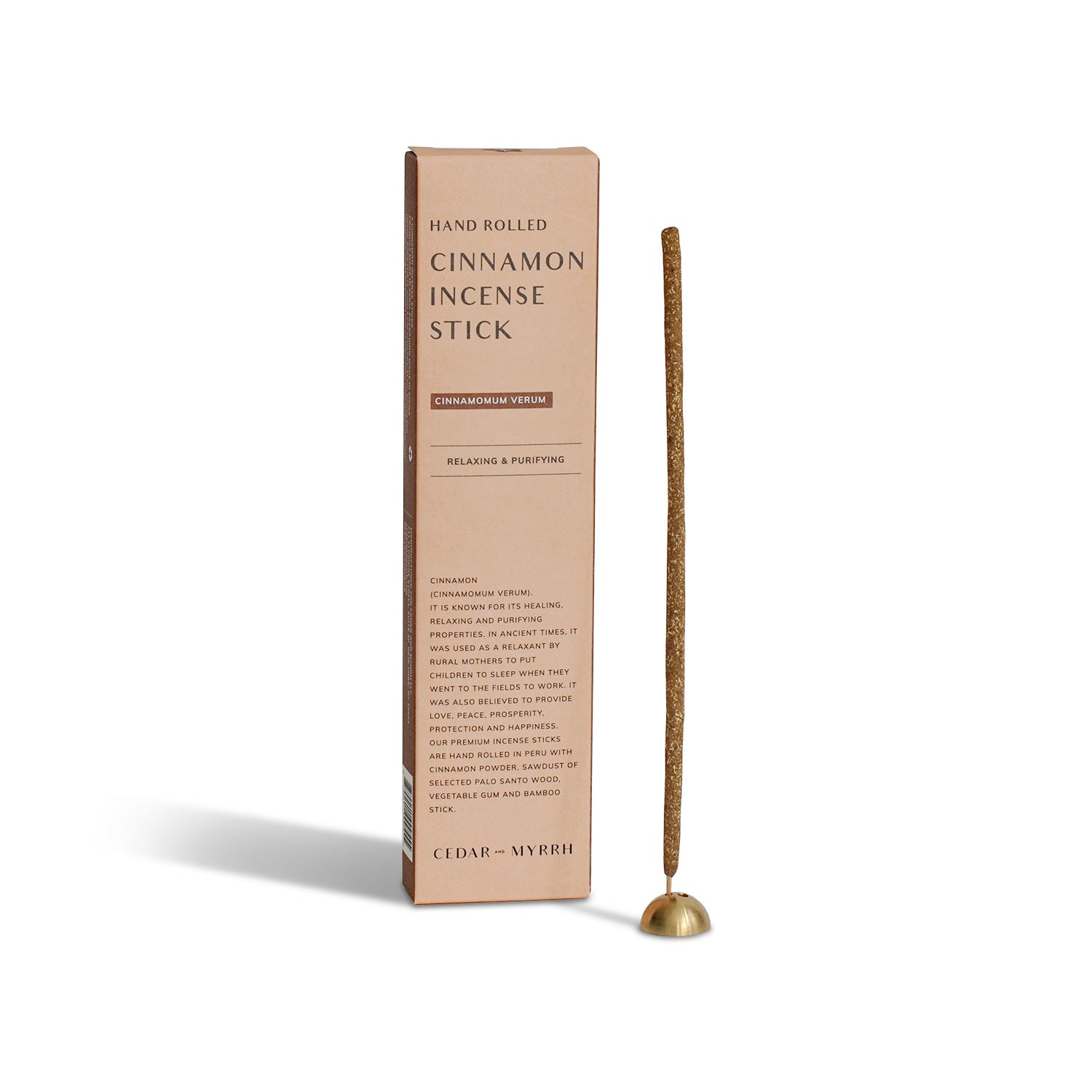 Cinnamon incense stick with packaging on a white background