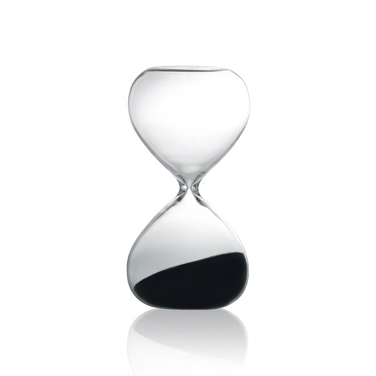 Clear hourglass with black sand on a white background