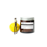Terralite candle labeled 'Lemon Vanilla' with a vanilla bean and lemon on a white background