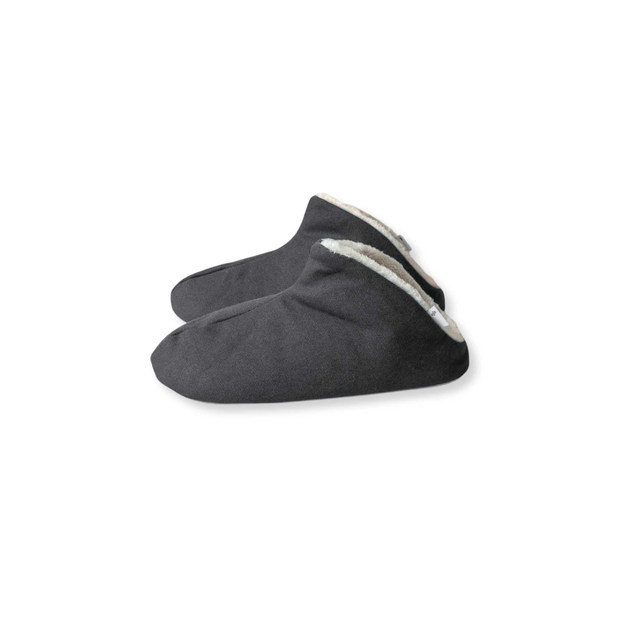 Pair of gray slippers with white lining on a white background