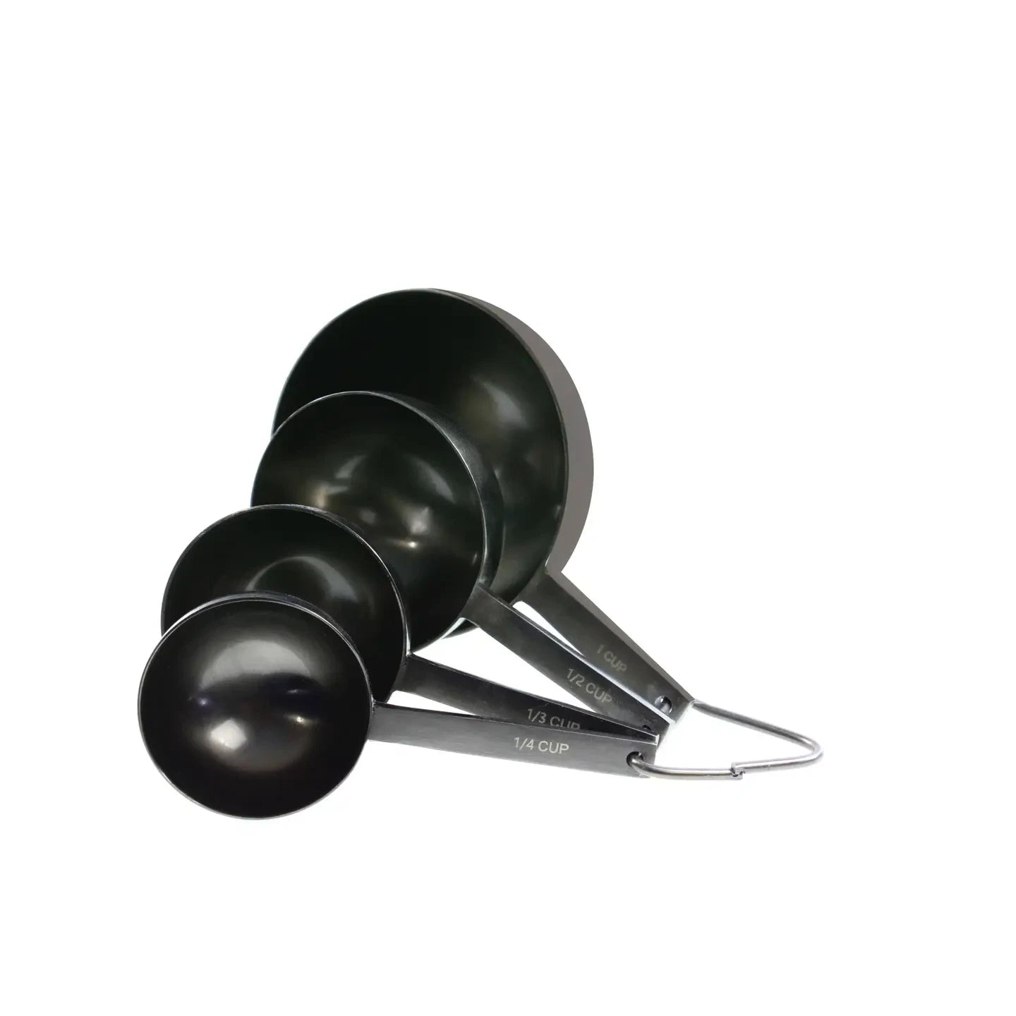 Set of black measuring spoons on a white background