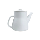 White ceramic teapot on a white background