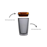 Full front view of MAHO Sensory's Cuddle Cup Eye of the Tiger with lid top open and text to inform that both lid and cup are made of 100% borosilicate glass