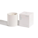 image of hudson oak scented candle cloud next to box