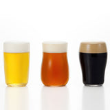 image of three large ishizuka beer glasses in a row filled with beer