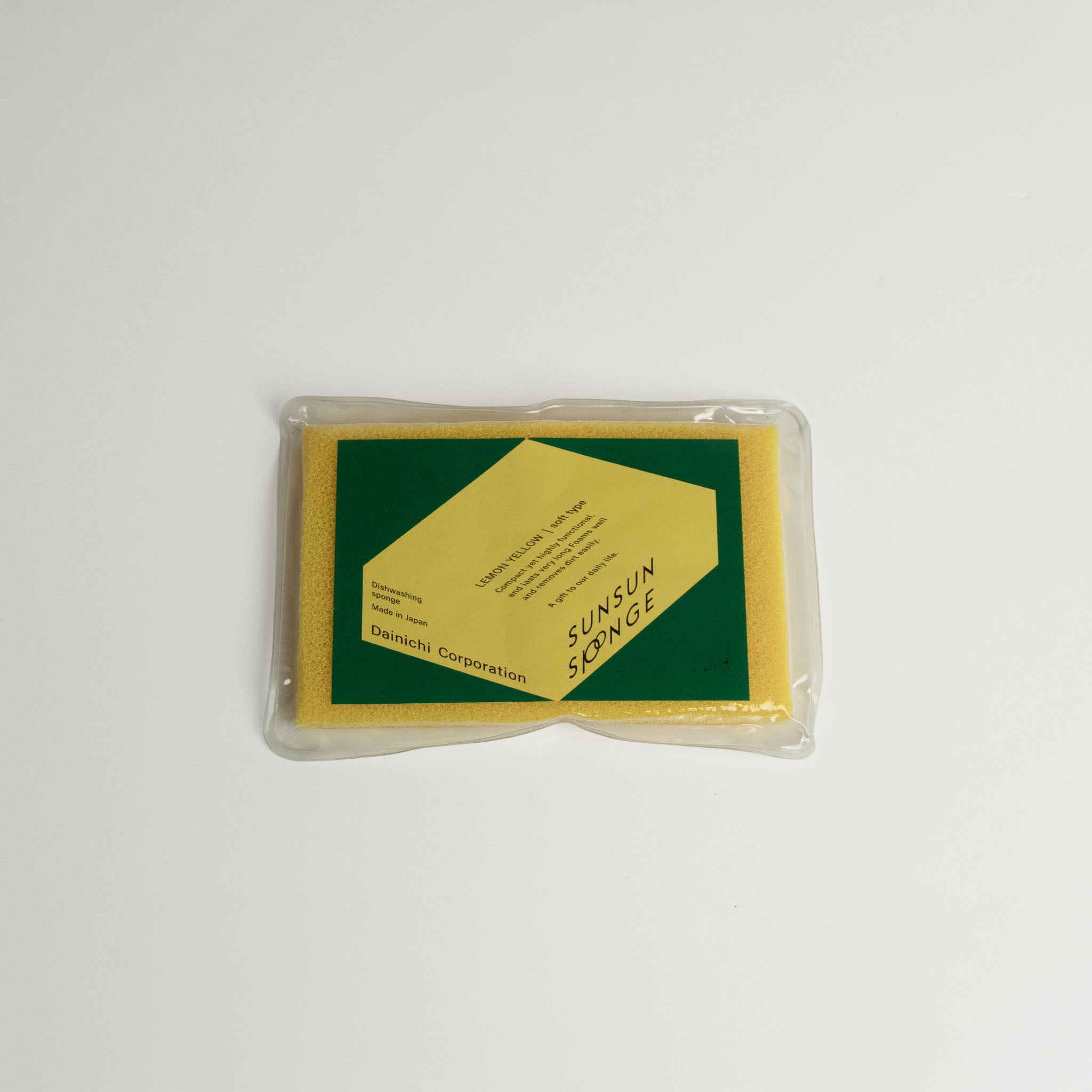 Yellow Sunsun sponge in packaging with on a white background
